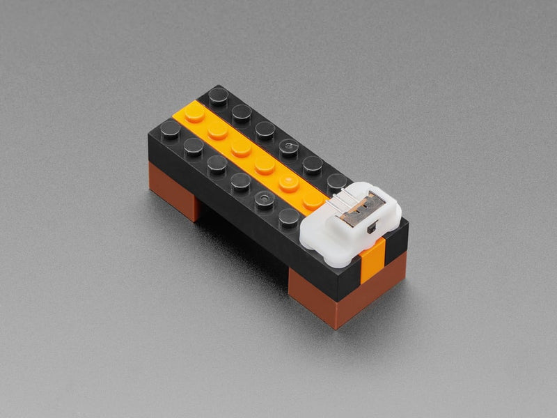 Slide Switch Mount for LEGO-Compatible Brick Systems